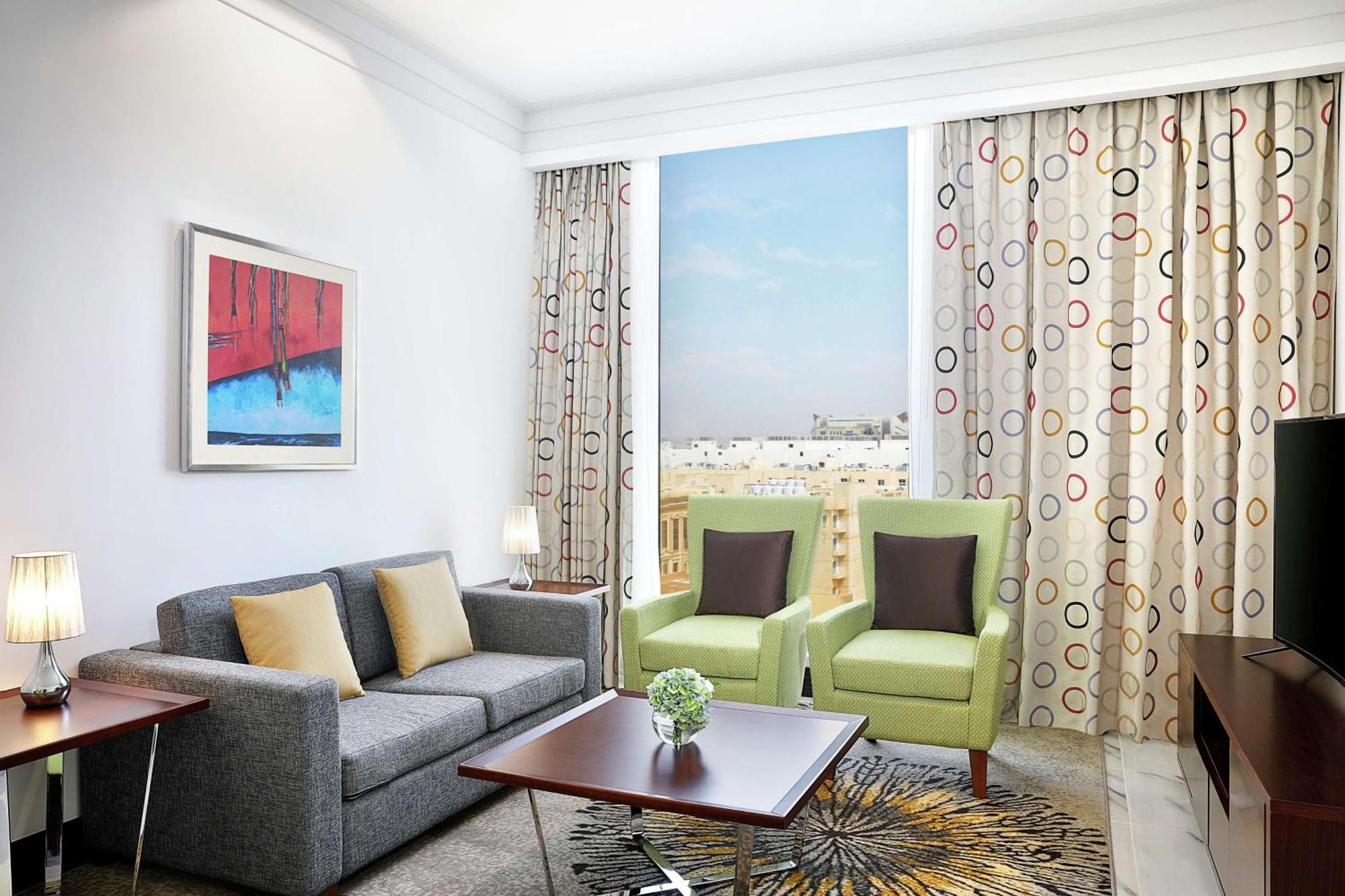 Doubletree By Hilton Doha - Al Sadd Hotel Kültér fotó A living room